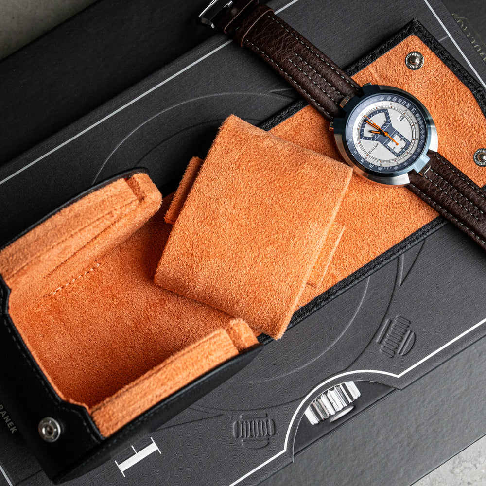 Single Travel Roll - black, black orange, travel roll for one watch, small travel roll, watch storage, how to travel safely with your watch, compact watch roll, watch roll interior, watch roll demonstration