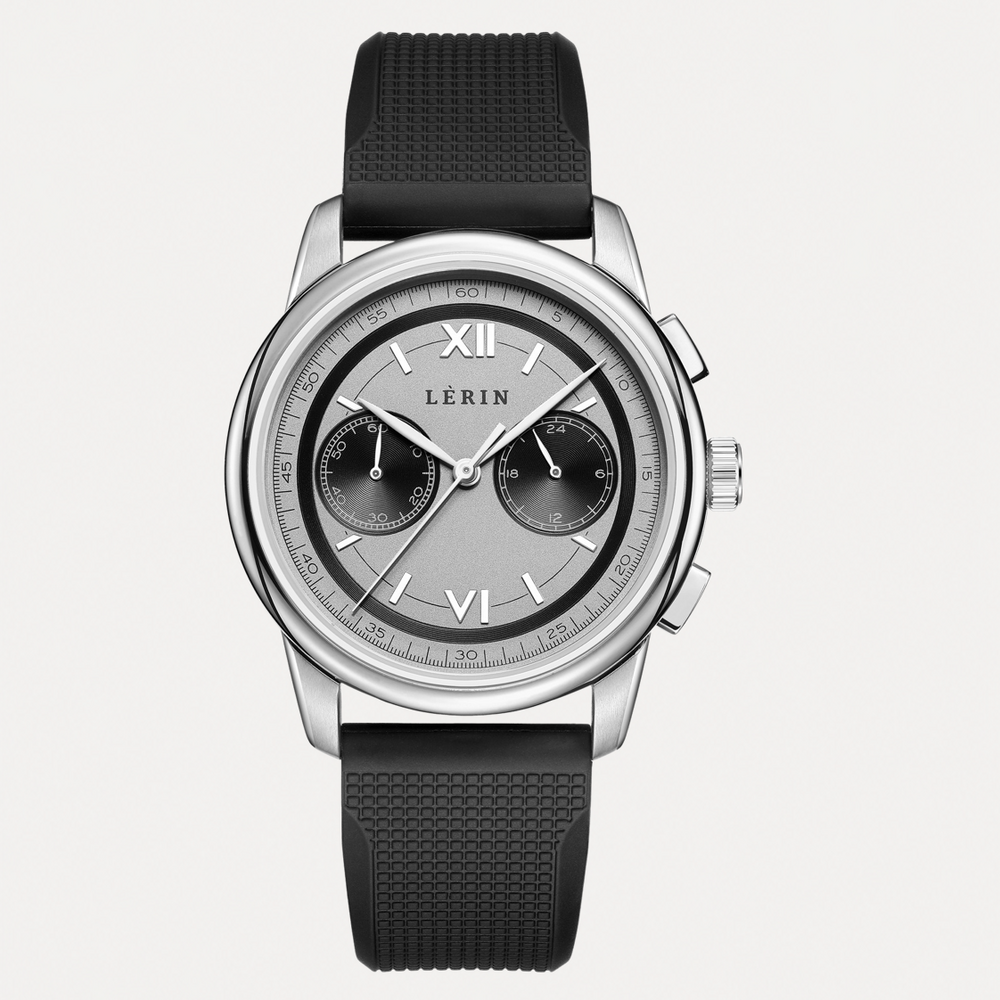 A LERIN chronograph watch with a silver-tone stainless steel case, a textured black strap, and a silver dial with black sub-dials and Roman numeral hour markers.