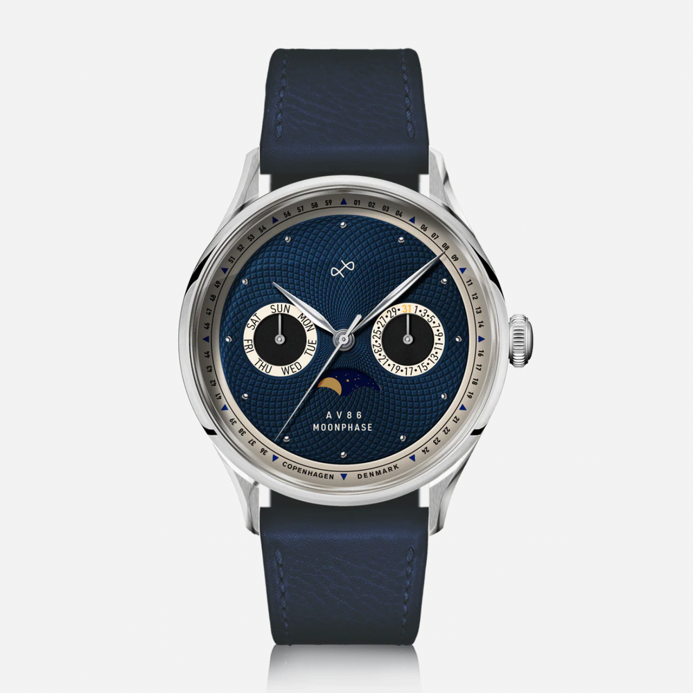 Blue watch with a detailed face on a white background